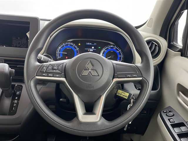 三菱 ｅＫワゴン M 秋田県 2024(令6)年 0.6万km ナチュラルアイボリーメタリック ４WD/オーディオレスバックカメラ/前席シートヒーター/前後コーナーセンサー/オートライト/盗難防止装置/横滑り防止装置/純正鉄チン/USB入力端子/ベンチコート/スマートキー/スペアキー