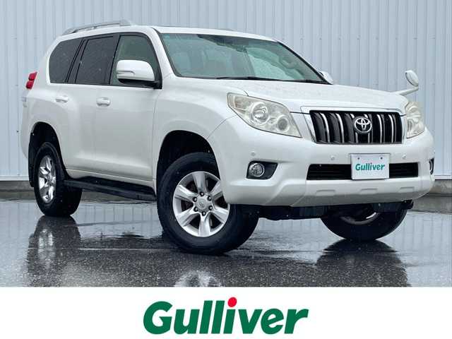 トヨタ ランドクルーザー プラド TX 滋賀県 2013(平25)年 11.4万km ホワイトパールクリスタルシャイン ワンオーナー/ムーンルーフ/寒冷地仕様/純正HDDナビ/・フルセグTV/・Bluetooth/・CD/DVD/・ミュージックサーバー/バックカメラ/ETC/トランスファースイッチ/センターデフロック/コーナーセンサー/オートライト/ルーフレール/フロアマット/スマートキー/保証書/取扱説明書