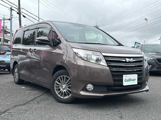 トヨタ ノア ハイブリッド G 愛知県 2014(平26)年 15.2万km ダークシェリーマイカM /禁煙車//純正ナビ・フルセグTV//バックカメラ//ビルトインETC//両側パワースライドドア//前席シートヒーター//ステアスイッチ//LEDオートライト//フォグランプ//クルーズコントロール//EV.ECO.PWRモード//純正ドアバイザー//純正フロアマット
