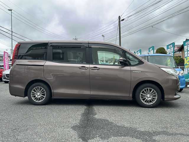 トヨタ ノア ハイブリッド G 愛知県 2014(平26)年 15.2万km ダークシェリーマイカM /禁煙車//純正ナビ・フルセグTV//バックカメラ//ビルトインETC//両側パワースライドドア//前席シートヒーター//ステアスイッチ//LEDオートライト//フォグランプ//クルーズコントロール//EV.ECO.PWRモード//純正ドアバイザー//純正フロアマット