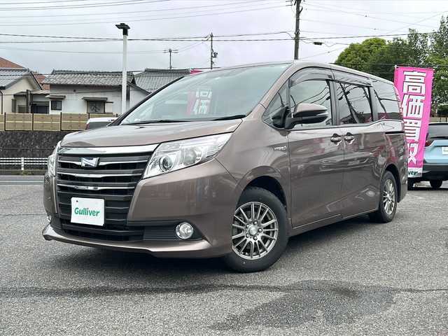 トヨタ ノア ハイブリッド G 愛知県 2014(平26)年 15.2万km ダークシェリーマイカM /禁煙車//純正ナビ・フルセグTV//バックカメラ//ビルトインETC//両側パワースライドドア//前席シートヒーター//ステアスイッチ//LEDオートライト//フォグランプ//クルーズコントロール//EV.ECO.PWRモード//純正ドアバイザー//純正フロアマット