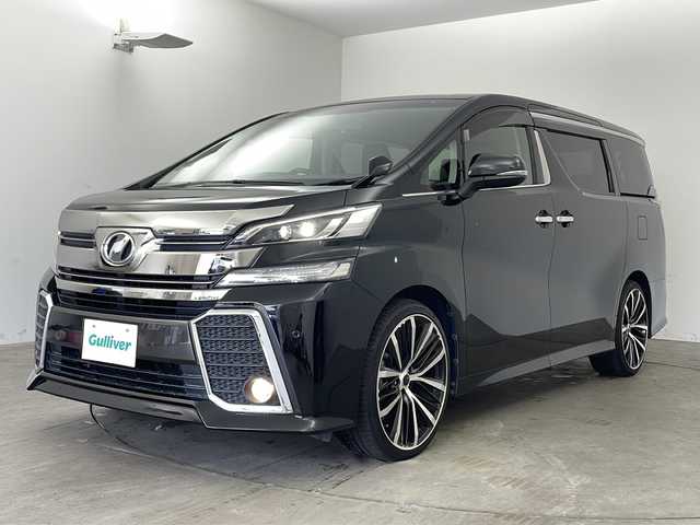 トヨタ ヴェルファイア Z Aエディション 兵庫県 2016(平28)年 7.4万km ブラック ・社外8インチナビ/CD/DVD/SD/BT/TV/・バックカメラ/・クルーズコントロール/・社外21インチAW/・社外ウッドコンビステアリング/・社外革調シートカバー/・前後コーナーセンサー/・左右独立エアコン/・後席エアコン/・両側パワースライドドア/・nanoe/・ウォークスルー/・ビルトインETC/・ステアリングリモコン/・純正フロアマット/・LEDオートライト/・LEDフォグランプ/・ウィンカーミラー/・電動格納ミラー/・スマートキー/・プッシュスタート