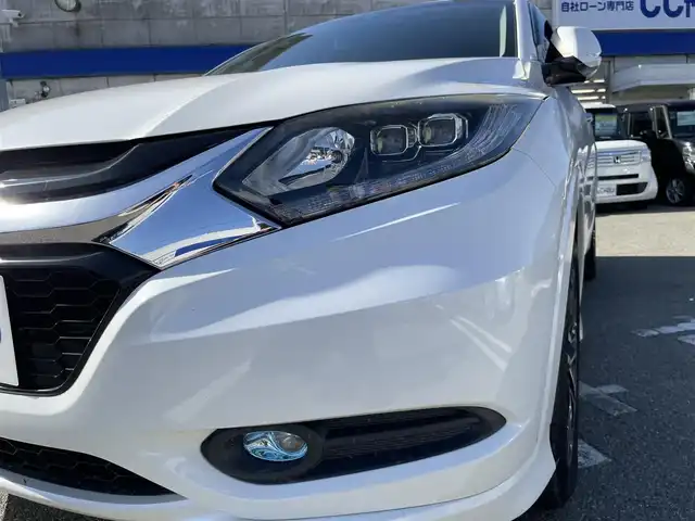 ホンダ ヴェゼル ハイブリッド Z 兵庫県 2014(平26)年 10.2万km ホワイトオーキッドパール 【(株)IDOMが運営する【じしゃロン姫路店】の自社ローン対象車両になります。こちらは現金ご利用時の価格です。自社ローンご希望の方は別途その旨お申付け下さい。】/純正ナビ/フルセグ/バックカメラ/クルーズコントロール/パドルシフト/ＥＴＣ/ハーフレザーシート/シートヒーター/ステアリングスイッチ/スマートキー/プッシュスタート/LEDヘッドライト