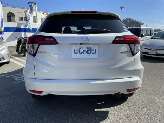 ホンダ ヴェゼル ハイブリッド Z 兵庫県 2014(平26)年 10.2万km ホワイトオーキッドパール 【(株)IDOMが運営する【じしゃロン姫路店】の自社ローン対象車両になります。こちらは現金ご利用時の価格です。自社ローンご希望の方は別途その旨お申付け下さい。】/純正ナビ/フルセグ/バックカメラ/クルーズコントロール/パドルシフト/ＥＴＣ/ハーフレザーシート/シートヒーター/ステアリングスイッチ/スマートキー/プッシュスタート/LEDヘッドライト