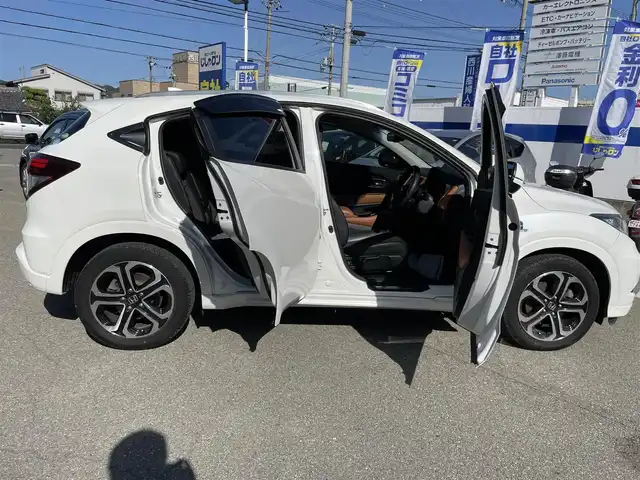 ホンダ ヴェゼル ハイブリッド Z 兵庫県 2014(平26)年 10.2万km ホワイトオーキッドパール 【(株)IDOMが運営する【じしゃロン姫路店】の自社ローン対象車両になります。こちらは現金ご利用時の価格です。自社ローンご希望の方は別途その旨お申付け下さい。】/純正ナビ/フルセグ/バックカメラ/クルーズコントロール/パドルシフト/ＥＴＣ/ハーフレザーシート/シートヒーター/ステアリングスイッチ/スマートキー/プッシュスタート/LEDヘッドライト