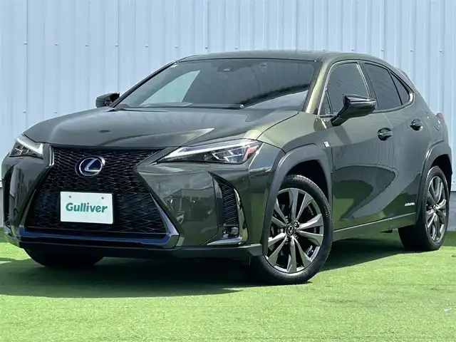 レクサス ＵＸ 250h Fスポーツ 香川県 2019(令1)年 3.7万km テレーンカーキマイカM サンルーフ/純正10.3型ナビ/（Bluetooth/フルセグTV/DVD/AUX/MSV/USB）/バックカメラ/レクサスセーフティシステム＋/・PCS（プリクラッシュセーフティ）/・レーダークルーズコントロール/・PDA（プロアクティブドライビングアシスト）/・AHS(アダプティブハイビームシステム）/・AHB(オートマチックハイビーム)/・LDA（レーンディパーチャーアラート）/・LTA（レーントレーシングアシスト）/・PDA（プロアクティブドライビングアシスト）/・RSA (ロードサインアシスト)/・発進遅れ告知機能/BSM（ブラインドスポットモニター）/クリアランスソナー/赤革レザーシート/前席ベンチレーション/・シートヒーター/シートクーラー/前席パワーシート/運転席メモリー機能/ステアリングヒーター/革巻きステアリング/ステアリングスイッチ/パドルシフト/電動パーキング/オートブレーキホールド/パワーバックドア/純正ドライブレコーダー/純正ETC2.0/純正18インチアルミホイール/純正フロアマット/社外フロアマット有/LEDヘッド/フォグライト/ヘッドライトウォッシャー