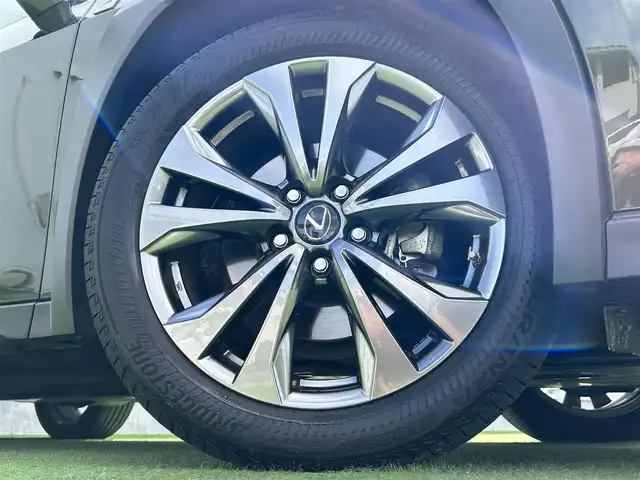 レクサス ＵＸ 250h Fスポーツ 香川県 2019(令1)年 3.7万km テレーンカーキマイカM サンルーフ/純正10.3型ナビ/（Bluetooth/フルセグTV/DVD/AUX/MSV/USB）/バックカメラ/レクサスセーフティシステム＋/・PCS（プリクラッシュセーフティ）/・レーダークルーズコントロール/・PDA（プロアクティブドライビングアシスト）/・AHS(アダプティブハイビームシステム）/・AHB(オートマチックハイビーム)/・LDA（レーンディパーチャーアラート）/・LTA（レーントレーシングアシスト）/・PDA（プロアクティブドライビングアシスト）/・RSA (ロードサインアシスト)/・発進遅れ告知機能/BSM（ブラインドスポットモニター）/クリアランスソナー/赤革レザーシート/前席ベンチレーション/・シートヒーター/シートクーラー/前席パワーシート/運転席メモリー機能/ステアリングヒーター/革巻きステアリング/ステアリングスイッチ/パドルシフト/電動パーキング/オートブレーキホールド/パワーバックドア/純正ドライブレコーダー/純正ETC2.0/純正18インチアルミホイール/純正フロアマット/社外フロアマット有/LEDヘッド/フォグライト/ヘッドライトウォッシャー