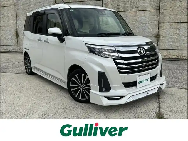 トヨタ ルーミー カスタムG－T 長崎県 2021(令3)年 5.6万km パールホワイトⅢ ワンオーナー/モデリスタエアロ（F/S/R下）/モデリスタマフラーカッター/純正9インチナビ/（CD/DVD/BT/フルセグ）/全方位カメラ/衝突軽減システム/レーンアシスト/レーダークルーズ/ETC/両側パワースライドドア/前後ドライブレコーダー/前後ソナー/オートライト/シートヒーター/純正15インチAW