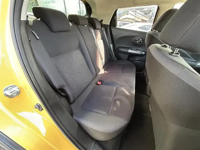 日産 ジューク 15RX Vセレクション 愛媛県 2016(平28)年 3.4万km サンライトイエロー 純正7型ナビ(Bluetooth/フルセグTV)/バックカメラ/アイドリングストップ/純正フロアマット/オートライト/ETC/プッシュスタート/革巻きステアリング/純正１７インチアルミホイール/テレビキャンセラー/現状サマー(純正AW)(215/55/R17)