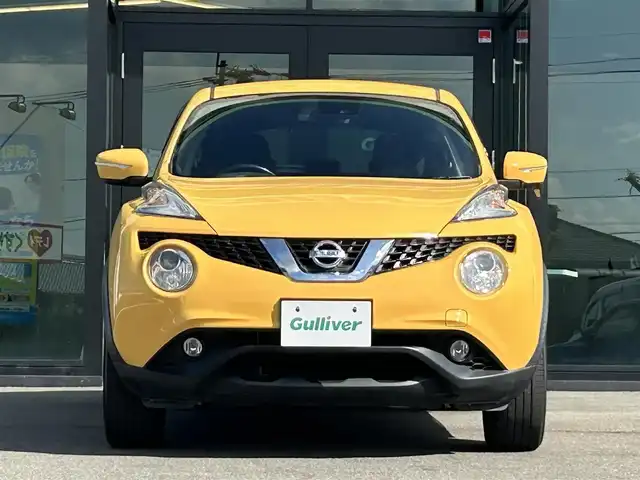 日産 ジューク 15RX Vセレクション 愛媛県 2016(平28)年 3.4万km サンライトイエロー 純正7型ナビ(Bluetooth/フルセグTV)/バックカメラ/アイドリングストップ/純正フロアマット/オートライト/ETC/プッシュスタート/革巻きステアリング/純正１７インチアルミホイール/テレビキャンセラー/現状サマー(純正AW)(215/55/R17)