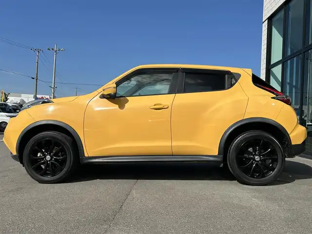 日産 ジューク 15RX Vセレクション 愛媛県 2016(平28)年 3.4万km サンライトイエロー 純正7型ナビ(Bluetooth/フルセグTV)/バックカメラ/アイドリングストップ/純正フロアマット/オートライト/ETC/プッシュスタート/革巻きステアリング/純正１７インチアルミホイール/テレビキャンセラー/現状サマー(純正AW)(215/55/R17)