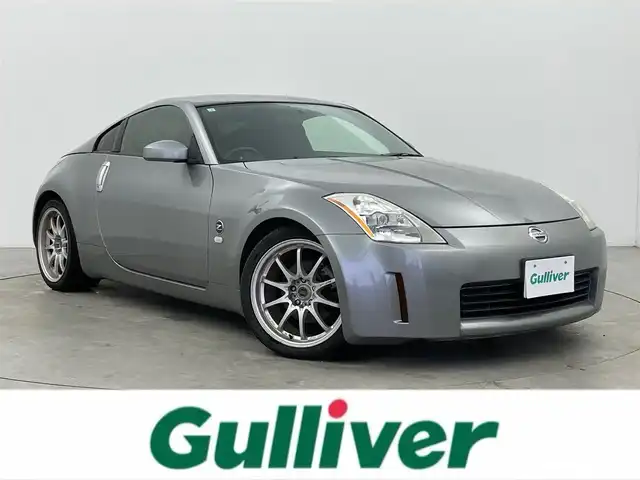 日産 フェアレディ Ｚ 富山県 2003(平15)年 5万km スパークリングシルバー カーオーディオ/CD/CDチェンジャー/トラクションコントロールシステム/センターコンソール/ETC/盗難防止装置/フロアマット純正/社外AW/キセノンライト/ABS/パワーステアリング/パワーウインドウ/リモコンキー×1
