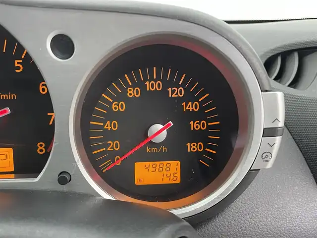 日産 フェアレディ Ｚ 富山県 2003(平15)年 5万km スパークリングシルバー カーオーディオ/CD/CDチェンジャー/トラクションコントロールシステム/センターコンソール/ETC/盗難防止装置/フロアマット純正/社外AW/キセノンライト/ABS/パワーステアリング/パワーウインドウ/リモコンキー×1