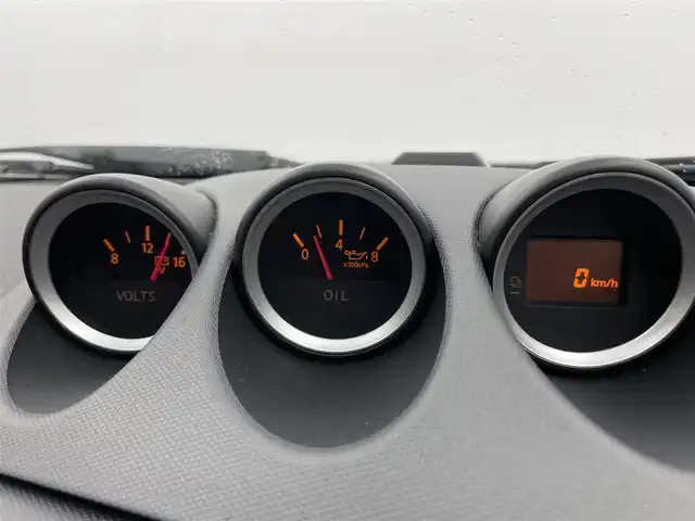 日産 フェアレディ Ｚ 富山県 2003(平15)年 5万km スパークリングシルバー カーオーディオ/CD/CDチェンジャー/トラクションコントロールシステム/センターコンソール/ETC/盗難防止装置/フロアマット純正/社外AW/キセノンライト/ABS/パワーステアリング/パワーウインドウ/リモコンキー×1