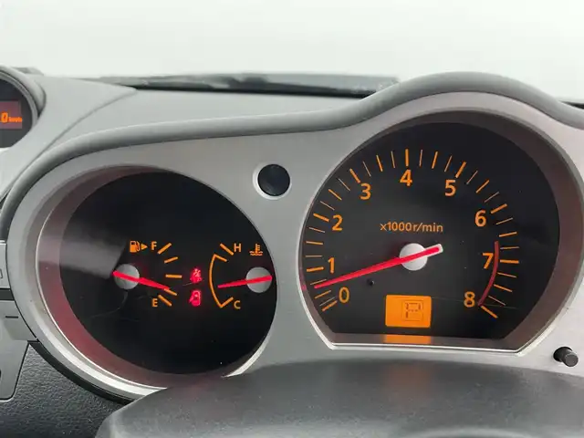 日産 フェアレディ Ｚ 富山県 2003(平15)年 5万km スパークリングシルバー カーオーディオ/CD/CDチェンジャー/トラクションコントロールシステム/センターコンソール/ETC/盗難防止装置/フロアマット純正/社外AW/キセノンライト/ABS/パワーステアリング/パワーウインドウ/リモコンキー×1