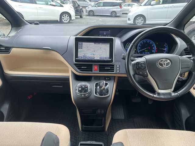 トヨタ ノア ハイブリッド G 神奈川県 2014(平26)年 8.6万km ホワイトパールクリスタルシャイン プッシュスタート/ビルトインETC/純正SDナビ/地デジTV/Bluetooth接続/DISC/AM/FM/クルーズコントロール/フリップダウンモニター/前席シートヒーター/横滑り防止装置/置くだけ充電/オートライト/LEDライト/フォグライト/電動格納ミラー/純正フロアマット