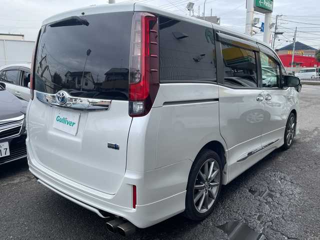 トヨタ ノア ハイブリッド G 神奈川県 2014(平26)年 8.6万km ホワイトパールクリスタルシャイン プッシュスタート/ビルトインETC/純正SDナビ/地デジTV/Bluetooth接続/DISC/AM/FM/クルーズコントロール/フリップダウンモニター/前席シートヒーター/横滑り防止装置/置くだけ充電/オートライト/LEDライト/フォグライト/電動格納ミラー/純正フロアマット