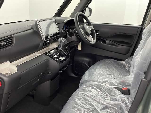 三菱 デリカミニ T プレミアム 新潟県 2025(令7)年 0.1万km未満 ＤグリーンⅡ 4WD/e-Assist/9型ディスプレイオーディオ/Bluetooth/全周囲カメラ/両側パワースライドドア/レーダークルーズコントロール/LEDオートライト/ハーフレザーシート/シートヒーター/純正15インチアルミホイール/ルーフレール/パドルシフト/ステアリングヒーター/ステアリングリモコン/ウィンカーミラー/電格ミラー/デジタルインナーミラー/スマートキー