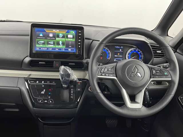 三菱 デリカミニ T プレミアム 新潟県 2025(令7)年 0.1万km未満 ＤグリーンⅡ 4WD/e-Assist/9型ディスプレイオーディオ/Bluetooth/全周囲カメラ/両側パワースライドドア/レーダークルーズコントロール/LEDオートライト/ハーフレザーシート/シートヒーター/純正15インチアルミホイール/ルーフレール/パドルシフト/ステアリングヒーター/ステアリングリモコン/ウィンカーミラー/電格ミラー/デジタルインナーミラー/スマートキー