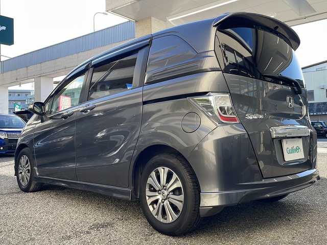 ホンダ フリード スパイク ハイブリット ジャストセレクション 兵庫県 2012(平24)年 3.4万km ポリッシュドメタルメタリック 純正ディーラーナビ（SD）/　AM/FM・USB・IPod・CD・DVD・SD・handsfree/フルセグTV/バックカメラ/両側パワースライドドア/クルーズコントロール/アイドリングストップ/アンチロック・ブレーキ・システム/盗難防止装置/横滑り防止装置/オートライト/純正アルミホイール/純正フロアマット/スマートキー/スペアキー×2/取扱説明書/保証書