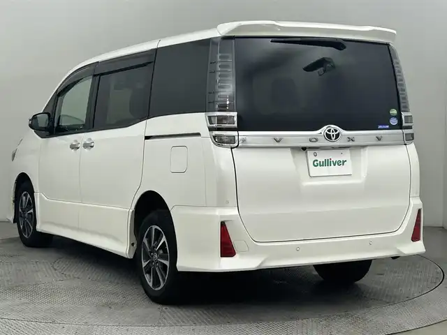 トヨタ ヴォクシー ZS 煌Ⅱ 道央・札幌 2019(令1)年 8.2万km ホワイトパールクリスタルシャイン ・4WD/・トヨタセーフティセンス/・衝突被害軽減ブレーキ/・レーンキープアシスト/・レーダークルーズコントロール/・オートハイビーム/・先行車発進告知/・純正メモリナビ/・フルセグ/BT/CD/DVD/・バックカメラ/・ビルトインETC/・両側パワースライドドア/・純正エンジンスターター/・前後ドライブレコーダー/・ドアロック連動ミラー/・横滑り防止装置/・スマートキー/・プッシュスタート/・MTモード