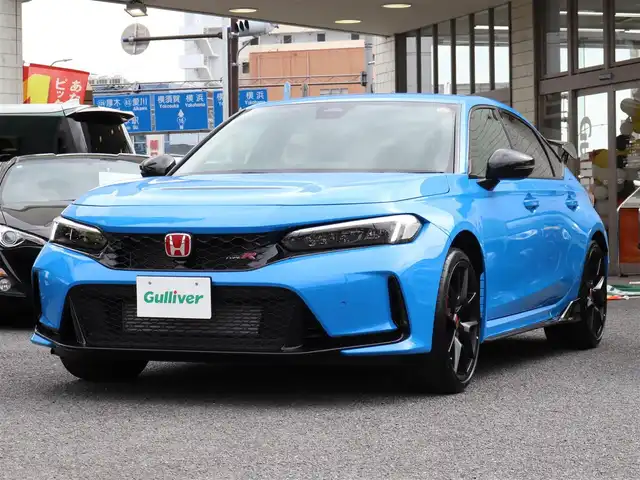 ホンダ シビック タイプR レーシングブラックPKG 神奈川県 2025(令7)年 0.1千km レーシングブルーパール 6速マニュアル/ワンオーナー/ブラインドスポットモニター/ETC2.0 /アジャイルハンドリングアシスト/バックカメラ/ワイヤレス充電/純正19インチAW/純正メモリナビ/フルセグテレビ/クルーズコントロール(追従機能付き)/プッシュスタート/コーナーセンサー/保証書/取説/スペアキー