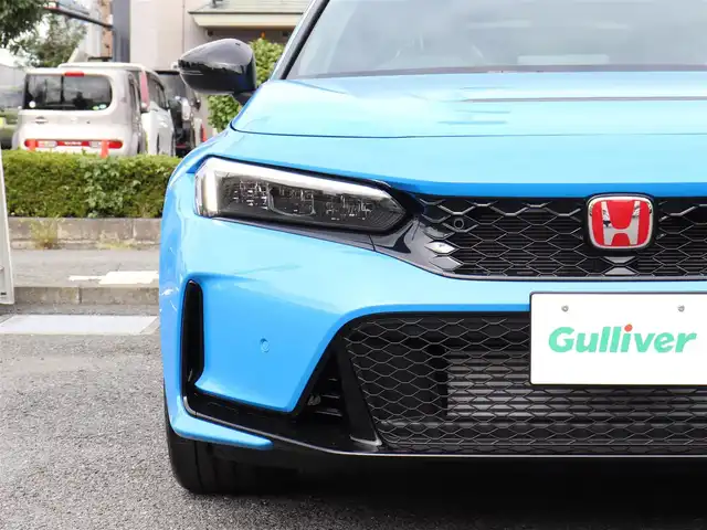 ホンダ シビック タイプR レーシングブラックPKG 神奈川県 2025(令7)年 0.1千km レーシングブルーパール 6速マニュアル/ワンオーナー/ブラインドスポットモニター/ETC2.0 /アジャイルハンドリングアシスト/バックカメラ/ワイヤレス充電/純正19インチAW/純正メモリナビ/フルセグテレビ/クルーズコントロール(追従機能付き)/プッシュスタート/コーナーセンサー/保証書/取説/スペアキー