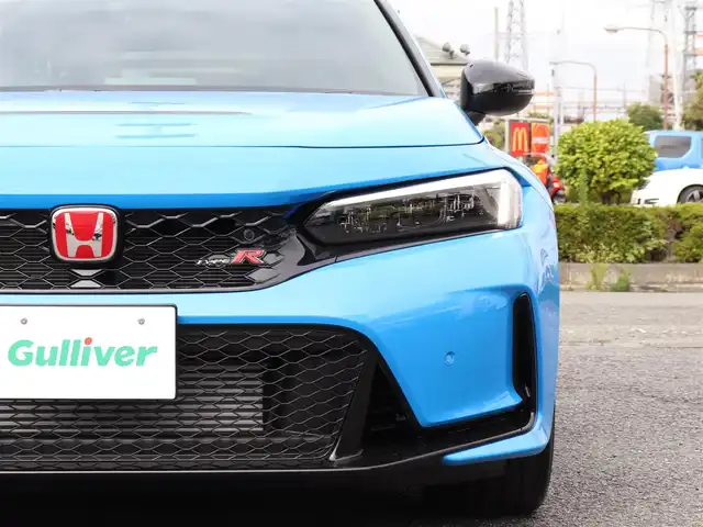 ホンダ シビック タイプR レーシングブラックPKG 神奈川県 2025(令7)年 0.1千km レーシングブルーパール 6速マニュアル/ワンオーナー/ブラインドスポットモニター/ETC2.0 /アジャイルハンドリングアシスト/バックカメラ/ワイヤレス充電/純正19インチAW/純正メモリナビ/フルセグテレビ/クルーズコントロール(追従機能付き)/プッシュスタート/コーナーセンサー/保証書/取説/スペアキー