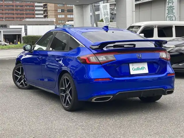 ホンダ シビック LX 福岡県 2021(令3)年 3.3万km プレミアムクリスタルブルークリスタル ワンオーナー/ホンダセンシング/レーダークルーズコントロール/ブラインドスポットモニター/純正メーカーナビ/（フルセグTV/FM/AM/Bluetooth）/バックカメラ/ドライブレコーダー/ビルトインETC2.0/前席シートヒーター/ハーフレザーシート/USB充電ポート/電動パーキングブレーキ/オートブレーキホールド/パーキングアシスト/クリアランスソナー/リアスポイラー/保証書/取扱説明書/スペアキー×１