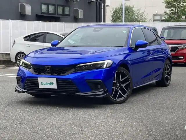 ホンダ シビック LX 福岡県 2021(令3)年 3.3万km プレミアムクリスタルブルークリスタル ワンオーナー/ホンダセンシング/レーダークルーズコントロール/ブラインドスポットモニター/純正メーカーナビ/（フルセグTV/FM/AM/Bluetooth）/バックカメラ/ドライブレコーダー/ビルトインETC2.0/前席シートヒーター/ハーフレザーシート/USB充電ポート/電動パーキングブレーキ/オートブレーキホールド/パーキングアシスト/クリアランスソナー/リアスポイラー/保証書/取扱説明書/スペアキー×１