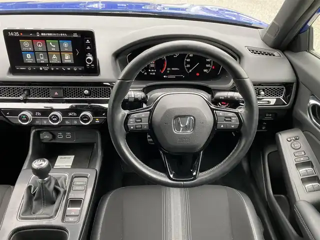 ホンダ シビック LX 福岡県 2021(令3)年 3.3万km プレミアムクリスタルブルークリスタル ワンオーナー/ホンダセンシング/レーダークルーズコントロール/ブラインドスポットモニター/純正メーカーナビ/（フルセグTV/FM/AM/Bluetooth）/バックカメラ/ドライブレコーダー/ビルトインETC2.0/前席シートヒーター/ハーフレザーシート/USB充電ポート/電動パーキングブレーキ/オートブレーキホールド/パーキングアシスト/クリアランスソナー/リアスポイラー/保証書/取扱説明書/スペアキー×１