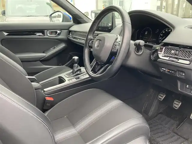 ホンダ シビック LX 福岡県 2021(令3)年 3.3万km プレミアムクリスタルブルークリスタル ワンオーナー/ホンダセンシング/レーダークルーズコントロール/ブラインドスポットモニター/純正メーカーナビ/（フルセグTV/FM/AM/Bluetooth）/バックカメラ/ドライブレコーダー/ビルトインETC2.0/前席シートヒーター/ハーフレザーシート/USB充電ポート/電動パーキングブレーキ/オートブレーキホールド/パーキングアシスト/クリアランスソナー/リアスポイラー/保証書/取扱説明書/スペアキー×１