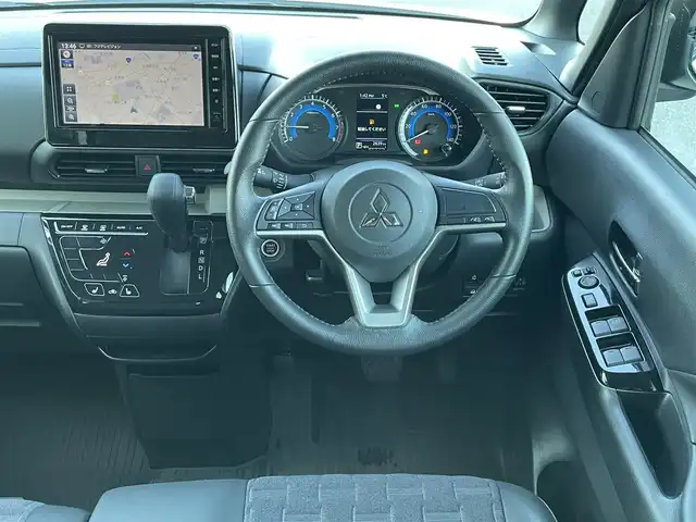 三菱 デリカミニ G 群馬県 2024(令6)年 0.3万km アメジストブラック/シルキーホワイト e-アシスト/・衝突軽減ブレーキシステム/・踏み間違い衝突防止アシスト/・車線逸脱警報システム/・車線逸脱防止支援機能/・オートマチックハイビーム/・ふらつき警報/・前方衝突予測警報/・標識検知システム/・先行車発進通知/純正9インチナビ/（BT/HDMI/SD）/フルセグTV/バックカメラ/パワースライドドア/ハーフレザー/シートヒーター（D席/N席）/ステアリングスイッチ/LEDヘッドライト/JAOS14インチAW