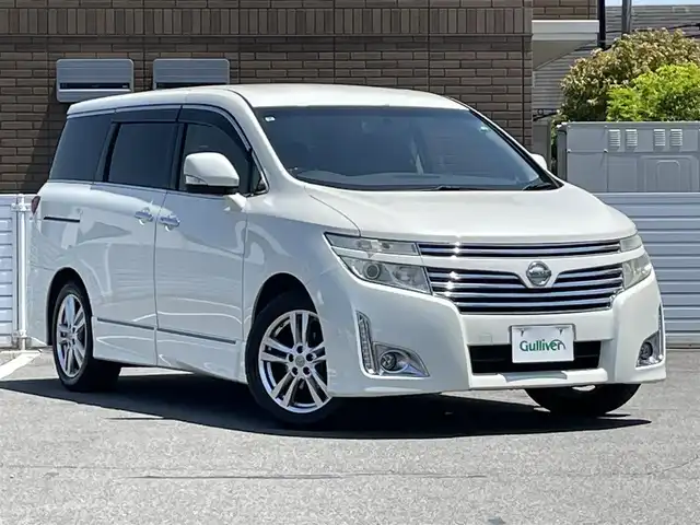 日産 エルグランド 250ハイウェイスター ブラックレザー 群馬県 2013(平25)年 10.4万km ブリリアントホワイトパール 純正メモリナビ（MC312D-W）/（CD、DVD、Bluetooth、フルセグTV）/バックカメラ/ビルトインETC/純正フロアマット/オットマン/プッシュスタート/両側パワースライドドア/スマートキー×２/保証書/取扱説明書