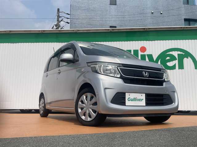 ホンダ Ｎ ＷＧＮ G 三重県 2015(平27)年 2.2万km カトラリーシルバーM 純正メモリナビ(VXM-164VFi)/　＊フルセグテレビ/Bluetooth/DVD/CD/バックカメラ/アイドリングストップ/ハロゲンヘッドランプ/ボディ同色電動格納ドアミラー/155/65R14タイヤ/　＊14インチフルホイールキャップ/プライバシーガラス/アナログメーター/SRSエアバック（運転席/助手席）/オートエアコン/スマートキーシステム/プッシュスタート