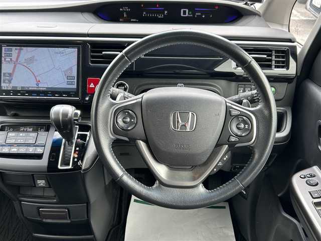 ホンダ ステップワゴン スパーダ ホンダセンシング 福島県 2017(平29)年 9.9万km ホワイトオーキッドパール 純正ナビ/・フルセグＴＶ/・Ｂｌｕｅｔｏｏｔｈ/・ＣＤ/・ＤＶＤ/・ＦＭ・ＡＭ/・ＵＳＢ端子/両側パワースライドドア/レーンアシスト/衝突軽減ブレーキ/クルーズコントール/後席モニター/ＬＥＤヘッドライト