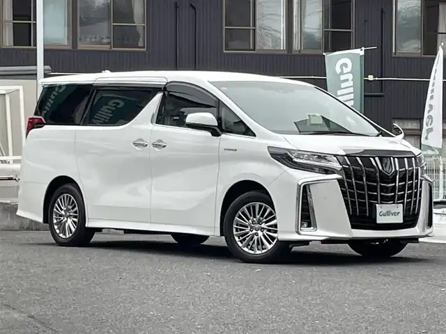 トヨタ アルファードハイブリット SR 宮城県 2019(令1)年 1.4万km ホワイトパールクリスタルシャイン ワンオーナー/4WD/純正メモリーナビ/（ＡＭ／ＦＭ／ＣＤ／ＤＶＤ／Ｂｌｕｅｔｏｏｔｈ）　/フルセグテレビ　/レザーシート　/プリクラッシュセーフティー　/レーダークルーズコントロール　/レーンキープアシスト　/コーナーセンサー/横滑り防止装置/オートマチックハイビーム/オートライト/前席シートヒーター/前席パワーシート/シートメモリー/パワーバックドア/両側パワースライドドア/スマートキー/プッシュスタート/ＥＴＣ/バックカメラ/電動パーキングブレーキ/電動格納ミラー/テレビキャンセラー/スペアタイヤ