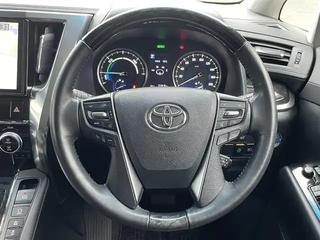 トヨタ アルファードハイブリット SR 宮城県 2019(令1)年 1.4万km ホワイトパールクリスタルシャイン ワンオーナー/4WD/純正メモリーナビ/（ＡＭ／ＦＭ／ＣＤ／ＤＶＤ／Ｂｌｕｅｔｏｏｔｈ）　/フルセグテレビ　/レザーシート　/プリクラッシュセーフティー　/レーダークルーズコントロール　/レーンキープアシスト　/コーナーセンサー/横滑り防止装置/オートマチックハイビーム/オートライト/前席シートヒーター/前席パワーシート/シートメモリー/パワーバックドア/両側パワースライドドア/スマートキー/プッシュスタート/ＥＴＣ/バックカメラ/電動パーキングブレーキ/電動格納ミラー/テレビキャンセラー/スペアタイヤ