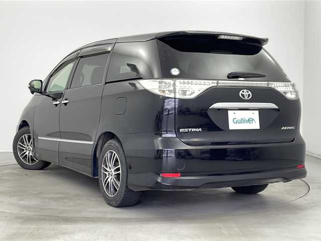 トヨタ エスティマ アエラス プレミアムエディション 新潟県 2013(平25)年 10.4万km ブラック 　バックカメラ/　クルーズコントロール/　ドアバイザー/　プッシュスタート/　両側パワースライドドア/　ETC/　HIDヘッドライト/　オートライト/　ハーフレザーシート/　純正AW車載/　ウィンカーミラー/　MTモード付AT