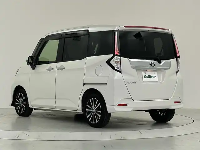 トヨタ ルーミー カスタムG－T 大阪府 2023(令5)年 2.4万km パールホワイトⅢ スマートアシスト/　・衝突回避支援ブレーキ機能/　・誤発進抑制制御機能/　・車線逸脱警報機能/　・先行者発信お知らせ機能/　・アダプティブクルーズコントロール/純正SDナビ/　Bluetooth/フルセグ/USB/CD/FM/AM/バックカメラ/両側パワースライドドア/レーダークルーズコントロール/LEDオートライト/フォグランプ/オートハイビーム/シートヒーター/純正１５インチアルミホイール/スマートキー/ビルトインETC