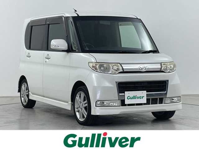 ダイハツ タント カスタム Vセレクションターボ 道央・札幌 2009(平21)年 10.1万km パールホワイトⅢ ・４WD/ターボ/・社外HDDナビ/CD/DVD/HDD/フルセグTV/・HIDヘッドライト/・片側パワースライドドア/・バックカメラ/・ウィンカーミラー/・ドアバイザー/・ETC/・冬タイヤ純正AW付き積込み/・盗難防止装置