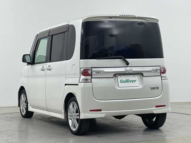 ダイハツ タント カスタム Vセレクションターボ 道央・札幌 2009(平21)年 10.1万km パールホワイトⅢ ・４WD/ターボ/・社外HDDナビ/CD/DVD/HDD/フルセグTV/・HIDヘッドライト/・片側パワースライドドア/・バックカメラ/・ウィンカーミラー/・ドアバイザー/・ETC/・冬タイヤ純正AW付き積込み/・盗難防止装置
