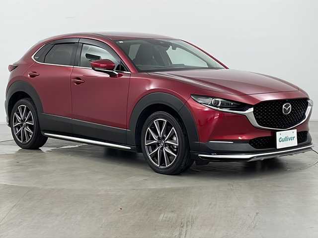 マツダ ＣＸ－３０ XD Lパッケージ 道央・札幌 2021(令3)年 2.6万km ソウルレッドクリスタルM ・4WD/・ディーゼル/・寒冷地仕様/・純正ナビ/・BT&CD&DVD&HDMI&TV/・AppleCarPlay&AndroidAuto/・全方位カメラ/・純正フルエアロ/・i-ACTIVSENSE/・ブラインドスポットモニター/・パドルシフト/・パワーバックドア/・レザーシート/・運転席パワーシートメモリー付/・前席シートヒーター/・ステアリングヒーター/・ステアリングスイッチ/・オートマチックハイビーム/・オートライト/・LEDヘッドライト&フォグ/・オートワイパー/・プッシュスタート/・スマートキー/・スペアキー1本/・社外エンジンスターター/・ビルトインETC/・純正ドライブレコーダー前後