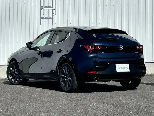 マツダ マツダ３ファストバック 20S ツーリング 熊本県 2024(令6)年 2万km ディープクリスタルブルーマイカ 純正ナビ/・AM/FM/USB/BT/HDMI/・アンドロイドオート/アップルカープレイ/・フルセグTV/全方位カメラ/レーダークルーズコントロール/ブラインドスポットモニター/ヘッドアップディスプレイ/スマートブレーキサポート/ハイビームコントロールシステム/レーンキープアシスト/前後ドライブレコーダー/D席メモリ付きパワーシート/前席シートヒーター/革巻きステアリング/ステアリングスイッチ/ステアリングヒーター/電動パーキングブレーキ/オートホールドブレーキ/アイドリングストップ/ETC/純正フロアマット/純正アルミホイール
