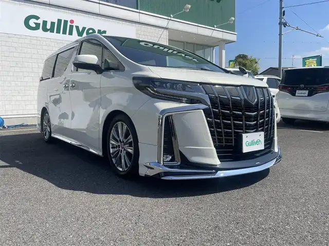 トヨタ アルファード S タイプゴールド 神奈川県 2021(令3)年 3.1万km ラグジュアリーホワイトパールクリスタルシャインガラスフレーク モデリスタエアロ/モデリスタマフラー/サンルーフ/純正１２．１型フリップダウンM/純正ディスプレイオーディオ/・ナビゲーション/・フルセグTV/・バックカメラ/両側電動スライドドア/ダウンサス/純正エンジンスターター/デジタルインナーミラー/トヨタセーフティセンス/・プリクラッシュセーフティ/・レーントレーシングアシスト/・レーダークルーズコントロール/・ハイビームアシスト/ブラインドスポットモニター/リアクロストラフィックアラート/パーキングサポートブレーキ/前後ドライブレコーダー/スマートキーX２/ビルトイン2.0ETC/新車時手帳・取説
