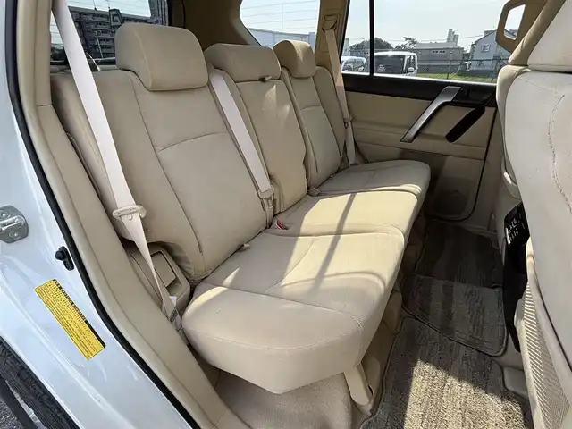 トヨタ ランドクルーザー プラド TX 大分県 2015(平27)年 6.7万km ホワイトパールクリスタルシャイン ・社外ナビ(CD.DVD.SD.BT)/・バックカメラ/・フルセグテレビ/・ベージュシート/・ETC/・MTモード付きAT/・オートライト/・スマートキー/・プッシュスタート/・フロアマット