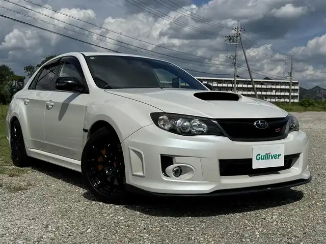 スバル インプレッサ ＷＲＸ STi tS タイプRA 兵庫県 2013(平25)年 6.3万km サテンホワイトパール HKSマフラー/STIフロントスポイラー/STIトランクスポイラー/純正ナビ/Bluetooth接続可/DVD再生可/フルセグTV/バックカメラ/STI純正18インチAW/専用ブレーキディスク/キーレスキー