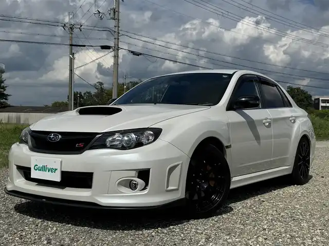 スバル インプレッサ ＷＲＸ STi tS タイプRA 兵庫県 2013(平25)年 6.3万km サテンホワイトパール HKSマフラー/STIフロントスポイラー/STIトランクスポイラー/純正ナビ/Bluetooth接続可/DVD再生可/フルセグTV/バックカメラ/STI純正18インチAW/専用ブレーキディスク/キーレスキー