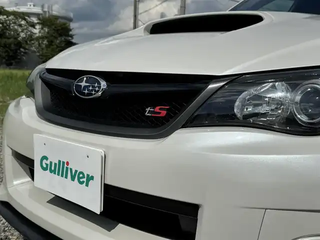 スバル インプレッサ ＷＲＸ STi tS タイプRA 兵庫県 2013(平25)年 6.3万km サテンホワイトパール HKSマフラー/STIフロントスポイラー/STIトランクスポイラー/純正ナビ/Bluetooth接続可/DVD再生可/フルセグTV/バックカメラ/STI純正18インチAW/専用ブレーキディスク/キーレスキー