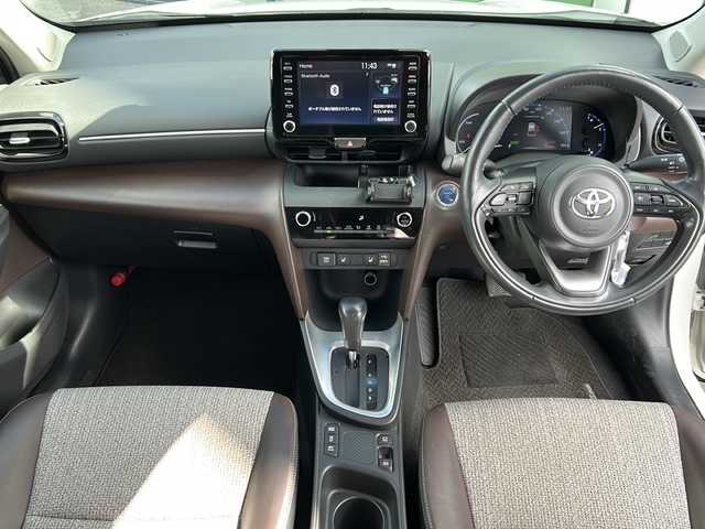 トヨタ ヤリスクロス ハイブリッド 岐阜県 2021(令3)年 4.7万km ホワイトパールクリスタルシャイン 登録時走行距離47090km/純正ディスプレイオーディオ/バックカメラ/クルーズコントロール/ステアリングヒーター/禁煙車/シートヒーター/ハーフレザーシート/ビルトインＥＴＣ/レーンキープアシスト/前後コーナーセンサー/プッシュスタート/スマートキー/スペアキー/電動リアゲート/LEDヘッドライト/オートライト/フォグランプ/オートマチックハイビーム/ドアバイザー/Bluetooth接続/USB入力端子/アイドリングストップ